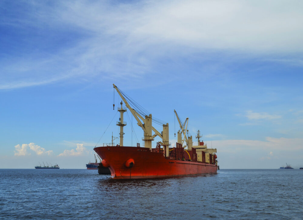 red-maintenance-boat-wide-sea-clear-sky red-maintenance-boat-wide-sea-clear-sky